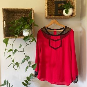 Lace detail, red, dressy top. Perfect for for a fancy party or a night out!